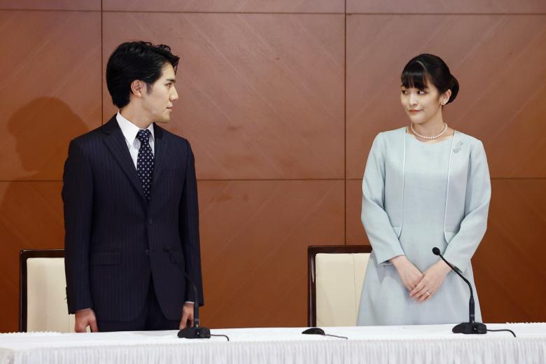 Mako Komuro (former Princess Mako of Akishino) and Kei Komuro attends a press conference at a hotel in Tokyo on October 26, 2021.