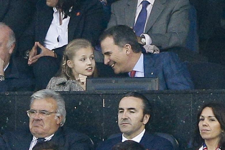 Spanish King Felipe VI and Princess Leonor and Esteban Rivas during the Champions League 1st leg semifinal at the Vicente Calderon stadium in Madrid, Spain, Wednesday, April 27, 2016.