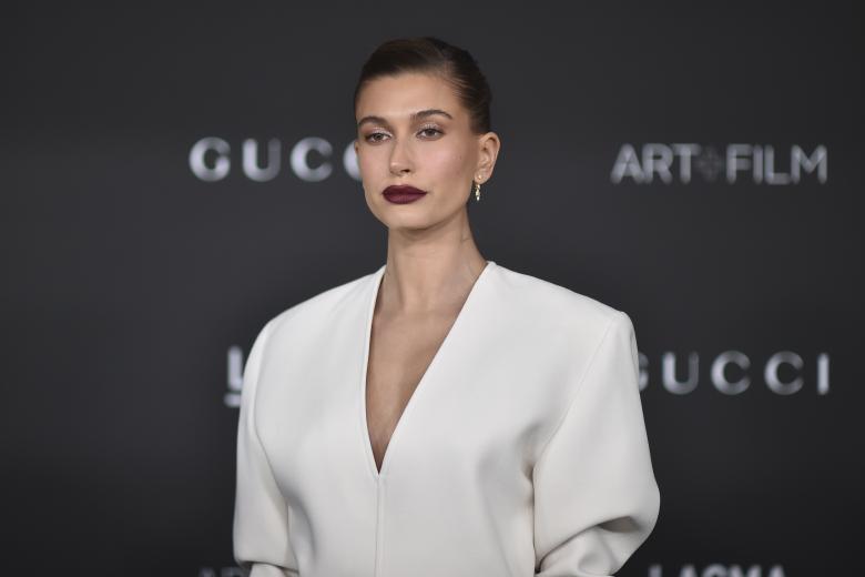 Hailey Bieber arrives at the LACMA Art + Film Gala on Saturday, Nov. 6, 2021, at Los Angeles County Museum of Art in Los Angeles. (Photo by Richard Shotwell/Invision/AP) *** Local Caption *** .