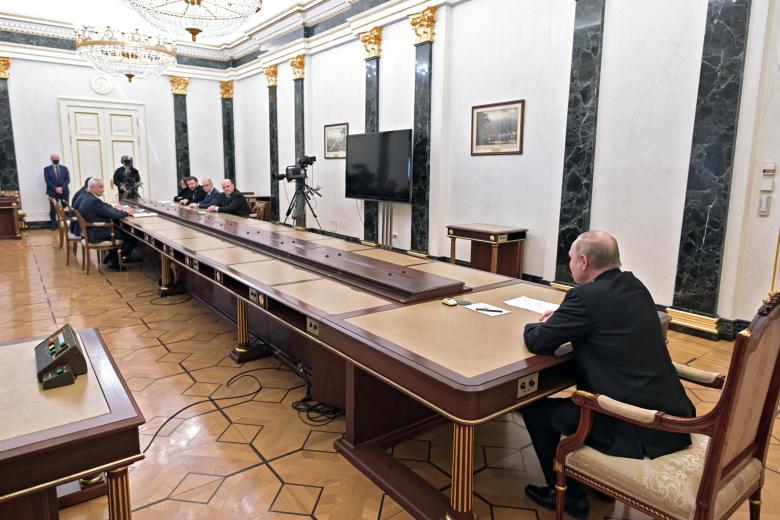 Russian President Vladimir Putin chairs a meeting on economic issues at the Kremlin in Moscow on February 28, 2022. - A defiant Russia said on February 28 it could ride out Western sanctions over its invasion of neighbouring Ukraine as President Vladimir Putin huddled with officials to discuss the economic turmoil of the five-day-old war. (Photo by Alexey NIKOLSKY / SPUTNIK / AFP)