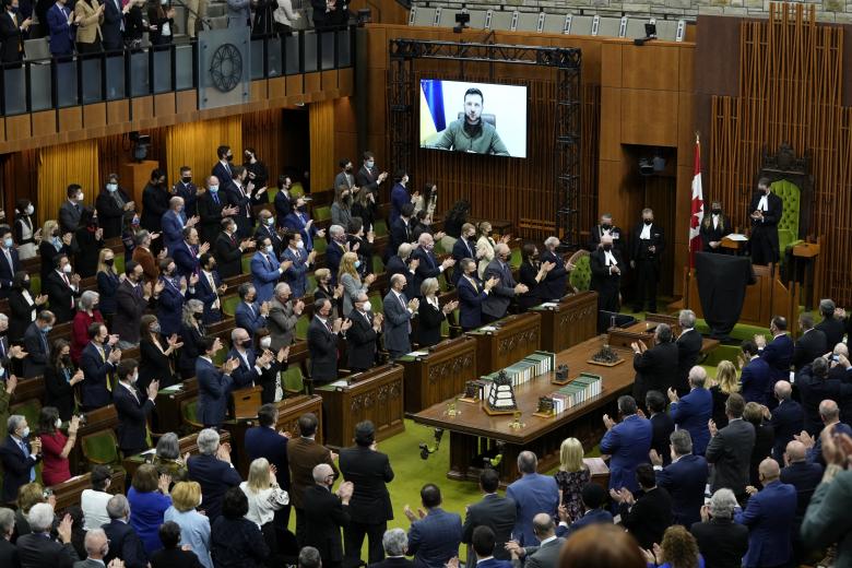 Ukrainian President Volodymyr Zelensky virtually addresses the Canadian Parliament in the House of Commons, on March 15, 2022, in Ottawa. (Photo by Justin Tang / POOL / AFP)