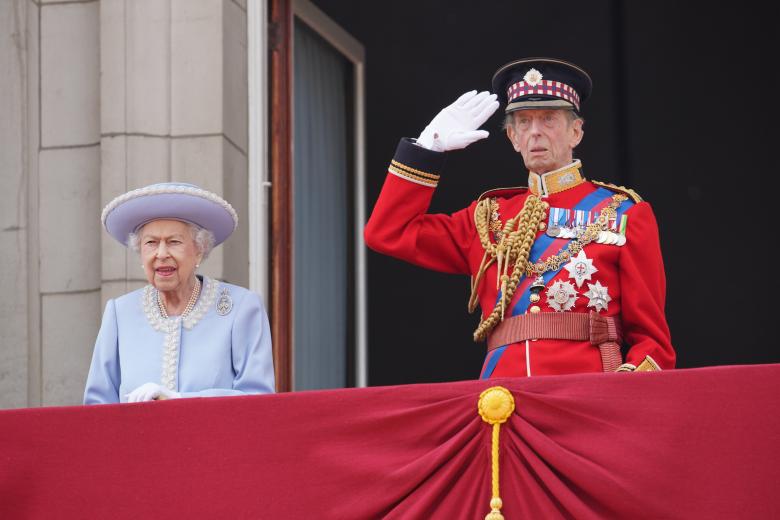 Queen Elizabeth II and the Duke of Kent watch from the balcony during the Trooping the Colour ceremony at Horse Guards Parade, central London, as the Queen celebrates her official birthday, on day one of the Platinum Jubilee celebrations. Picture date: Thursday June 2, 2022. *** Local Caption *** .