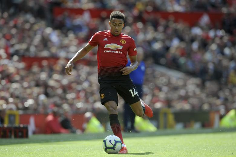 Manchester United's Jesse Lingard controls the ball during the English Premier League soccer match between Manchester United and Cardiff City at Old Trafford in Manchester, England, Sunday, May 12, 2019.   *** Local Caption *** .