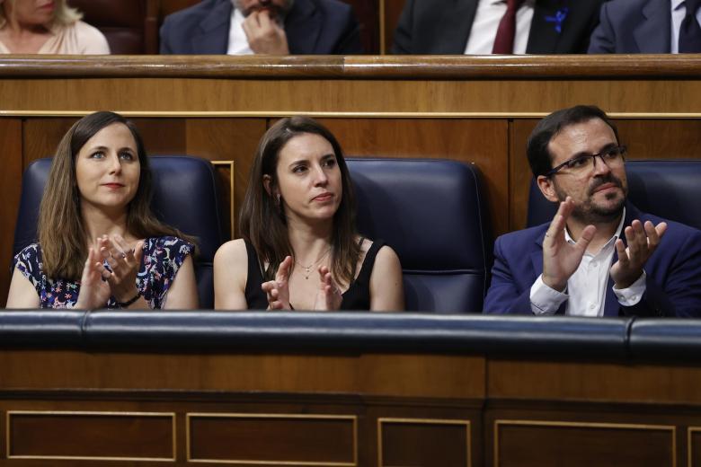 Los ministros de Derechos Sociales, Ione Belarra (i); Igualdad, Irene Montero y de Consumo, Alberto Garzón