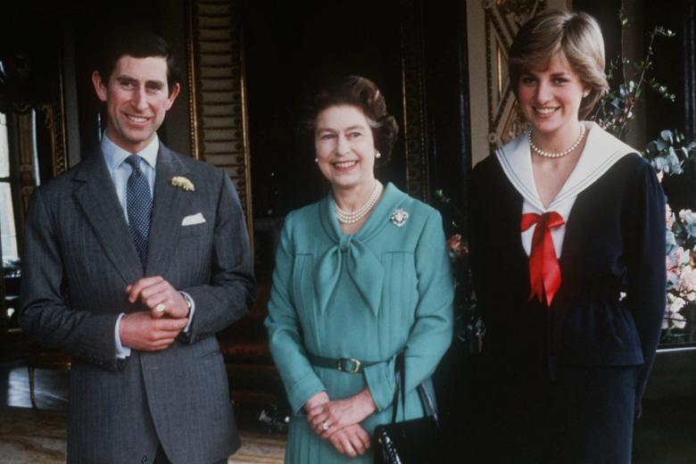 Lady Diana Spencer and Prince Charles pose with  Queen Elizabeth II, center, in Buckingham Palace in March 27, 1981, after the queen gave her formal consent to the couple for marriage. (