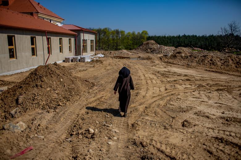 Drasty (Czech Republic), 04/04/2023.- A nun from the Discalced Carmelites order stands inside the construction site of the Church of Saint Teresa of Jesus in the village of Drasty, Czech Republic, 04 April 2023 (issued 28 April 2023). With their mission to Prague coming to an end, and tired of the capital's nightlife noises, the nuns moved to Drasty in 2018. After learning how to operate tractors and excavators, with the help of the local community, the order is currently building their new convent in the small town north of Prague (República Checa, Praga) EFE/EPA/MARTIN DIVISEK ATTENTION: This Image is part of a PHOTO SET