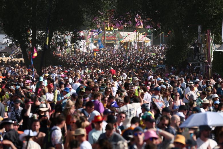 Large crowds move through the Glastonbury Festival in Pilton, Britain, 23 June 2023. The Glastonbury Festival is a five-day festival of music, dance, theatre, comedy and performing arts running from 21 to 25 June 2023