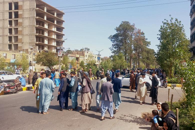 People gather on the streets in Herat on October 7, 2023. A magnitude 6.3 earthquake hit western Afghanistan October 7 morning, the United States Geological Survey said, followed by four large aftershocks with epicentres close to the region's largest city. (Photo by AFP)