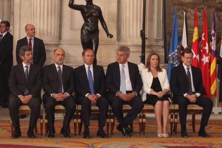 Spanish King Juan Carlos I and Crown Prince Felipe of Borbon during  the signing of the abdication law of Spain King Juan Carlos at the Royal Palace of Madrid on Wednesday 18th June 2014