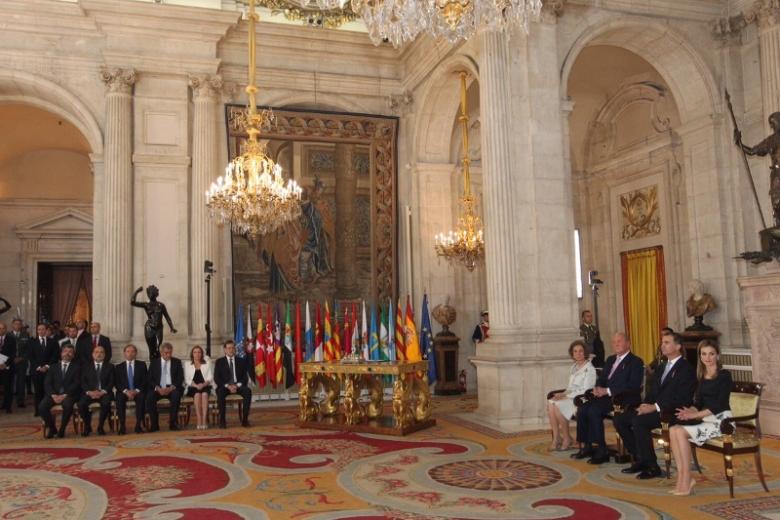 Spanish King Juan Carlos I and Crown Prince Felipe of Borbon during  the signing of the abdication law of Spain King Juan Carlos at the Royal Palace of Madrid on Wednesday 18th June 2014