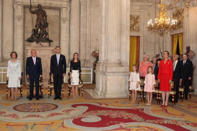 Spanish King Juan Carlos I and Crown Prince Felipe of Borbon during  the signing of the abdication law of Spain King Juan Carlos at the Royal Palace of Madrid on Wednesday 18th June 2014