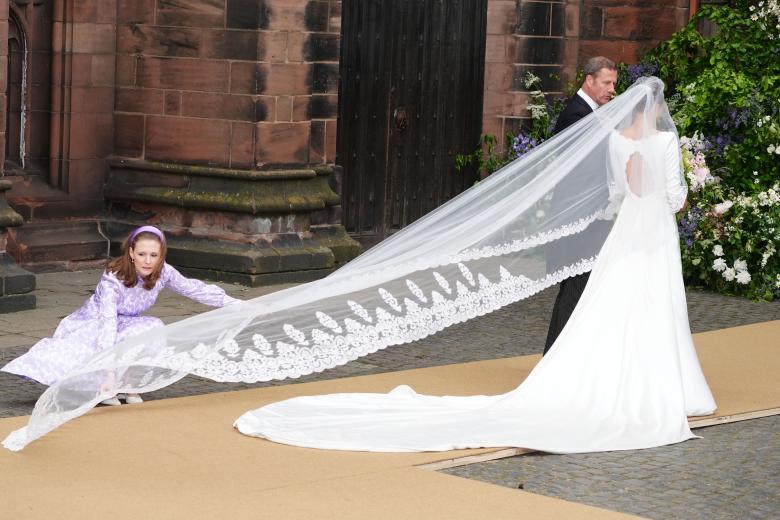 Olivia Henson arrives for her wedding to Hugh Grosvenor, the Duke of Westminster at Chester Cathedral. Picture date: Friday June 7, 2024.