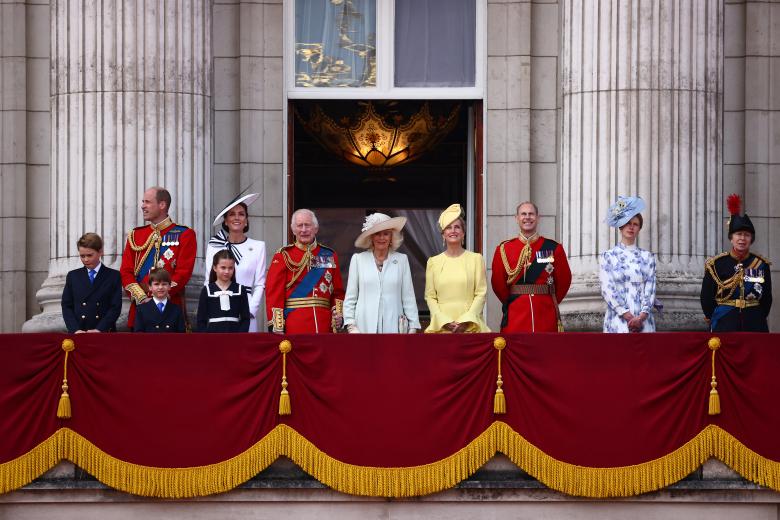 Britain's King Charles III (C-L) and Britain's Queen Camilla (C-R) stand with (L-R) Britain's Prince George of Wales, Britain's Prince William, Prince of Wales, Britain's Prince Louis of Wales, Britain's Catherine, Princess of Wales, Britain's Princess Charlotte of Wales, Britain's Sophie, Duchess of Edinburgh, Britain's Prince Edward, Duke of Edinburgh, Britain's Lady Louise Windsor and Britain's Princess Anne, Princess Royal, on the balcony of Buckingham Palace after attending the King's Birthday Parade "Trooping the Colour" in London on June 15, 2024. The ceremony of Trooping the Colour is believed to have first been performed during the reign of King Charles II. Since 1748, the Trooping of the Colour has marked the official birthday of the British Sovereign. Over 1500 parading soldiers and almost 300 horses take part in the event. (Photo by HENRY NICHOLLS / AFP)