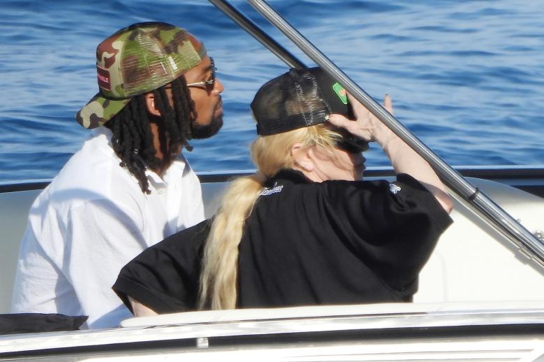 BGUK_2998405 - Portofino, ITALY  - The Legendary American Singer/Songwriter Madonna spotted out in the Italian sunshine arriving at Dolce and Gabbana's Portofino Villa with her new mystery man.

The 65-year old showed off her cool side, wearing her New York Yankee top, sunglasses and cap as she arrived in style via a boat as the 'Queen of Pop' was helped ashore by her entourage as she spends her holidays at the designers pad with her mystery beau.

Pictured: Madonna

BACKGRID UK 11 AUGUST 2024 

BYLINE MUST READ: COBRA TEAM / BACKGRID

UK: +44 208 344 2007 / uksales@backgrid.com

USA: +1 310 798 9111 / usasales@backgrid.com

*Pictures Containing Children Please Pixelate Face Prior To Publication* *** Local Caption *** .