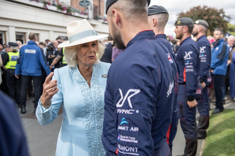 Queen Camilla (centre) during a visit to open the Bustardthorpe Development at York Racecourse, which has been designed to improve the experience for racegoers and has sustainability at its heart, with rainwater harvest tanks, solar panels and a living roof during day four of the Sky Bet Ebor Festival at York Racecourse. Picture date: Saturday August 24, 2024. *** Local Caption *** .