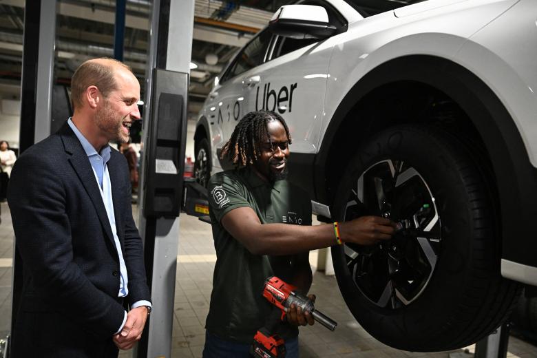 The Prince of Wales speaking to a worker during a visit to the 2023 Earthshot Prize Finalist, ENSO, in Brentford, west London, as they announce a pioneering new strategic partnership with Uber across the UK and USA. The London-based start-up, which was a Finalist in the 2023 "Clean Our Air" category, creates tyres specifically designed for electric vehicles that are more sustainable and reduce harmful tyre pollution, leading to cleaner air for everyone. Picture date: Tuesday October 1, 2024. *** Local Caption *** .