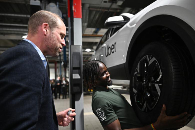 The Prince of Wales holding a car tyre during a visit to the 2023 Earthshot Prize Finalist, ENSO, in Brentford, west London, as they announce a pioneering new strategic partnership with Uber across the UK and USA. The London-based start-up, which was a Finalist in the 2023 "Clean Our Air" category, creates tyres specifically designed for electric vehicles that are more sustainable and reduce harmful tyre pollution, leading to cleaner air for everyone. Picture date: Tuesday October 1, 2024. *** Local Caption *** .