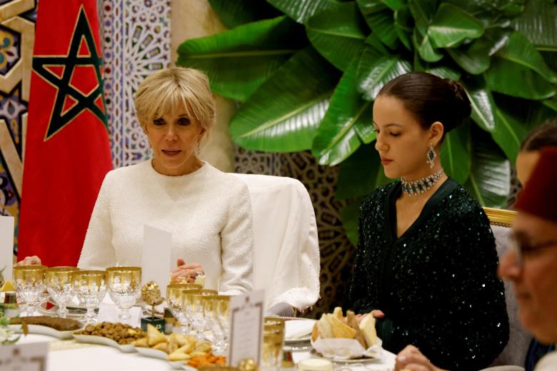 French President's wife Brigitte Macron (L) attends a state dinner at the Royal Palace in Rabat, on October 29, 2024, as part of a three-day state visit by France's President to Morocco. Photo by Ludovic Marin/Pool/ABACAPRESS.COM