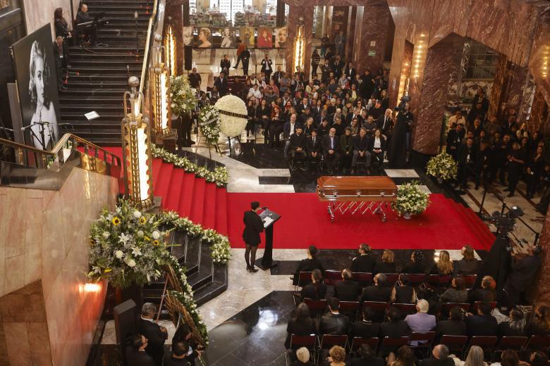 Relatives attend the funeral of Mexican actress Silvia Pinal at the Bellas Artes Palace, in Mexico City on November 30, 2024. Pinal, considered the last Mexican cinema diva, muse of Spanish filmmaker Luis Bunuel and star of television and theater, died on November 28, at the age of 93, Mexico's Ministry of Culture reported. (Photo by Rodrigo Oropeza / AFP)