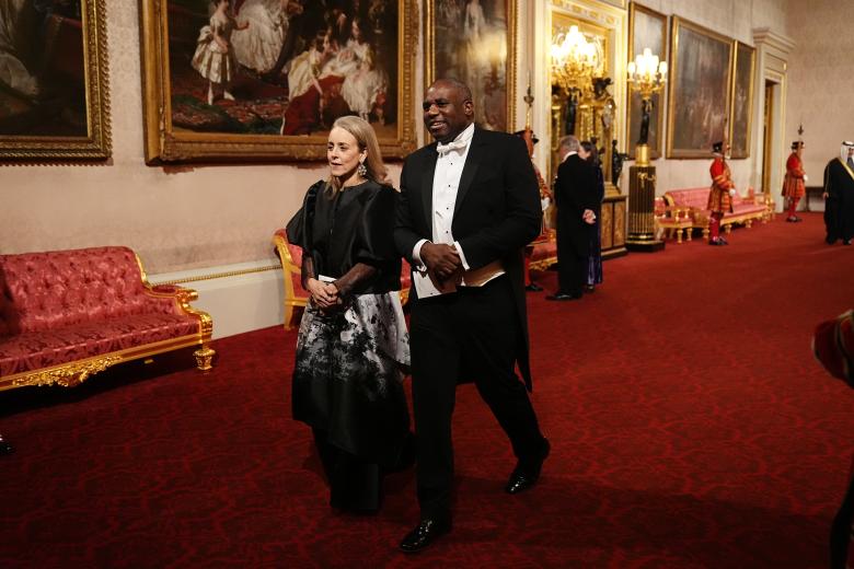 David and Victoria Beckham make their way along the East Gallery to attend the state banquet for the Emir of Qatar Sheikh Tamim bin Hamad Al Thani at Buckingham Palace, London, during his state visit to the UK. Picture date: Tuesday December 3, 2024.