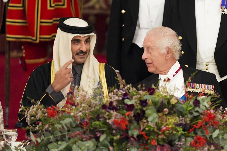 The Princess Royal and H.E. Sheikh Mohammed bin Abdulrahman bin Jassim Al Thani make their way along the East Gallery to attend the state banquet for the Emir of Qatar Sheikh Tamim bin Hamad Al Thani at Buckingham Palace, London, during his state visit to the UK. Picture date: Tuesday December 3, 2024. *** Local Caption *** .