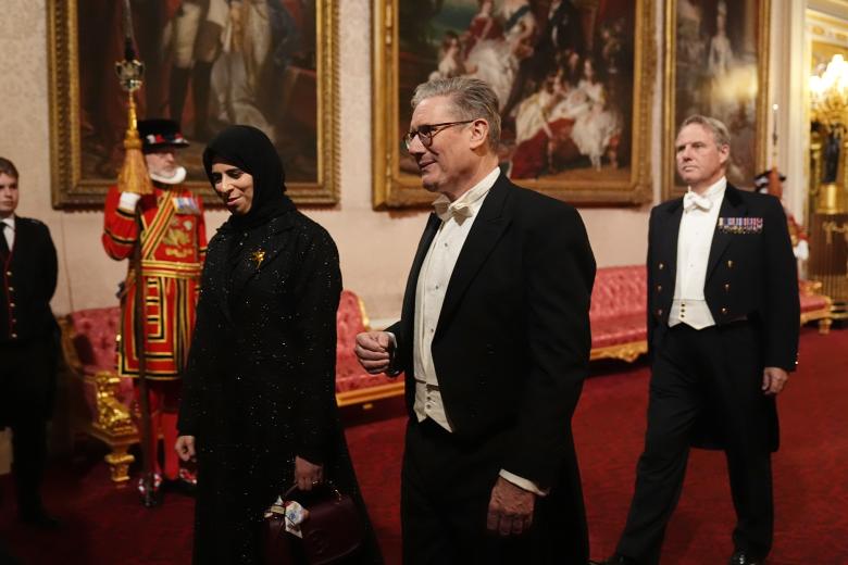 The Duchess of Edinburgh and H.E. Mr. Saad bin Sherida Al Kaabi make their way along the East Gallery to attend the state banquet for the Emir of Qatar Sheikh Tamim bin Hamad Al Thani at Buckingham Palace, London, during his state visit to the UK. Picture date: Tuesday December 3, 2024. *** Local Caption *** .