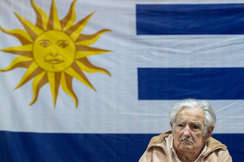 Uruguayan former President (2010-2015) Jose Mujica votes during the presidential and legislative elections in Montevideo on October 27, 2024. Uruguayans vote Sunday in presidential elections with a leftist favored to unseat the incumbent conservative, although a runoff looked likely. (Photo by Pablo PORCIUNCULA / AFP)