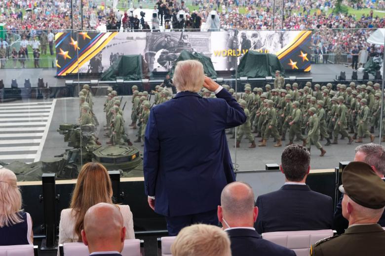 Armoured vehicles drive across the Memorial Bridge during the Army 250th Anniversary Parade in Washington, DC, on June 14, 2025. Trump's long-held dream of a parade will come true as nearly 7,000 troops plus dozens of tanks and helicopters rumble through the capital in an event officially marking the 250th anniversary of the US army. (Photo by ANNABELLE GORDON / AFP)
