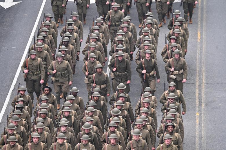 Tanks and infantry march during the Army 250th Anniversary Parade in Washington, DC on June 14, 2025. Trump's long-held dream of a parade will come true as nearly 7,000 troops plus dozens of tanks and helicopters rumble through the capital in an event officially marking the 250th anniversary of the US army. (Photo by Alex WROBLEWSKI / AFP)