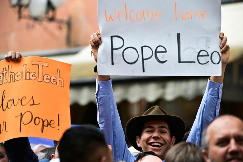 This photo taken and handout on June 13, 2025 by Vatican Media shows Pope Leo XIV (R) gesturing during an Angelus prayer at Castel Gandolfo near Rome. (Photo by Handout / VATICAN MEDIA / AFP) / RESTRICTED TO EDITORIAL USE - MANDATORY CREDIT "AFP PHOTO / VATICAN MEDIA / SIMONE RISOLUTI - HANDOUT - NO MARKETING NO ADVERTISING CAMPAIGNS - DISTRIBUTED AS A SERVICE TO CLIENTS