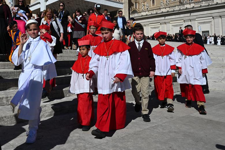 A group of students of Our Lady of Mount Carmel Academy of Chicago leave after attending the Pope Leo XIV's weekly general audience at St Peter's Square in The Vatican on October 8, 2025. (Photo by Andreas SOLARO / AFP)