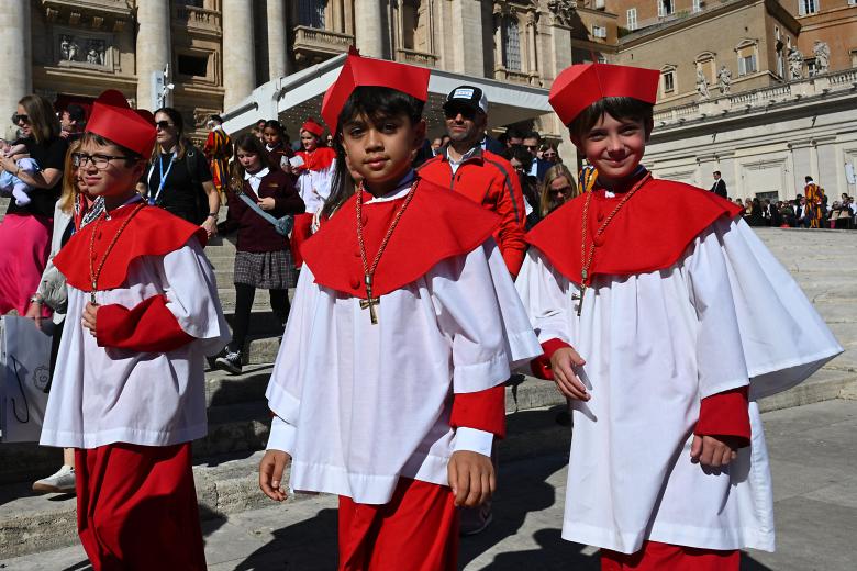 A group of students of Our Lady of Mount Carmel Academy of Chicago leave after attending the Pope Leo XIV's weekly general audience at St Peter's Square in The Vatican on October 8, 2025. (Photo by Andreas SOLARO / AFP)