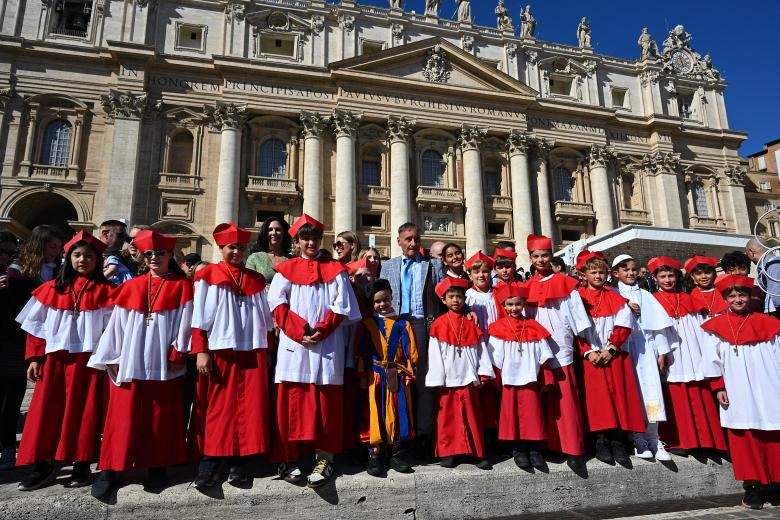 A group of students of Our Lady of Mount Carmel Academy of Chicago leave after attending the Pope Leo XIV's weekly general audience at St Peter's Square in The Vatican on October 8, 2025. (Photo by Andreas SOLARO / AFP)