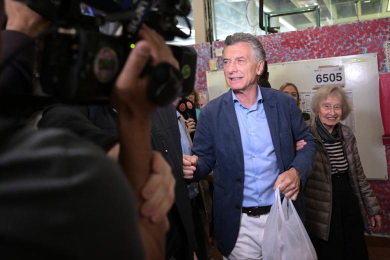 Buenos Aires province governor Axel Kicillof poses for a picture before casting his vote at a polling station during the national midterm legislative election in La Plata, Buenos Aires Province, Argentina, on October 26, 2025. Argentines head to the polls for a midterm election that will determine whether President Javier Milei enters the second half of his term bolstered or diminished as economic troubles abound despite unprecedented US aid. (Photo by AFP)