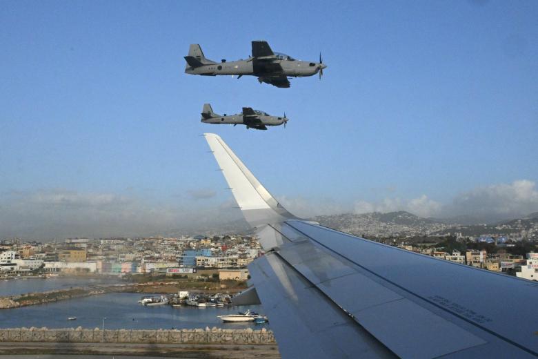 Lebanese military plane escort the plane of Pope Leo XIV before to land in Beirut for a two-day visit in Lebanon, on November 30, 2025. (Photo by Andreas SOLARO / POOL / AFP)