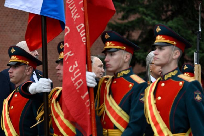 Russian President Vladimir Putin attends a ceremony to lay flowers at the Tomb of the Unknown Soldier by the Kremlin wall in central Moscow on May 9, 2026. Russia celebrates the 81st anniversary of the Soviet Union's victory over Nazi Germany in World War Two (WWII). (Photo by Alexander NEMENOV / POOL / AFP)