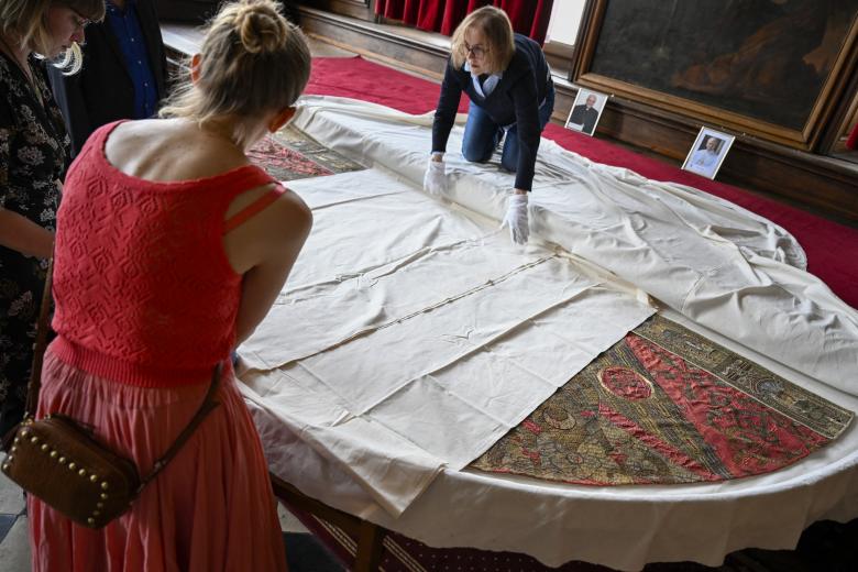People assemble a mockup of Saint-Etienne Cathedral, where Pope Leo XIV will hold a mass on September 28, in the crypt of the cathedral in Metz, eastern France, on September 3, 2026. Leo XIV's stop in Metz on September 28 will mark the first papal visit to the city since Pope John Paul II in 1988, and will close out his four-day apostolic journey to France that also esi:includes Paris and Lourdes. (Photo by Jean-Christophe VERHAEGEN / AFP)
