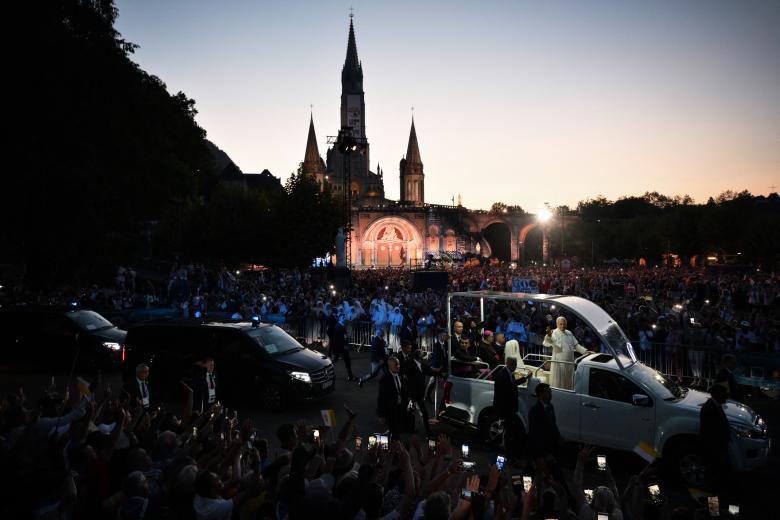 This photograph shows the statue of the Virgin Mary before the arrival of Pope Leo XIV to lead a prayer with worshippers at the Grotto of Massabielle in the Sanctuary of Our Lady of Lourdes, southwestern France, on September 26, 2026 on the second day of his visit to France. (Photo by Alberto PIZZOLI / AFP)