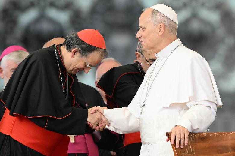 Pope Leo XIV greets cardinals as he arrives for the weekly general audience at St Peter's Square in The Vatican on October 21, 2026. (Photo by Tiziana FABI / AFP)