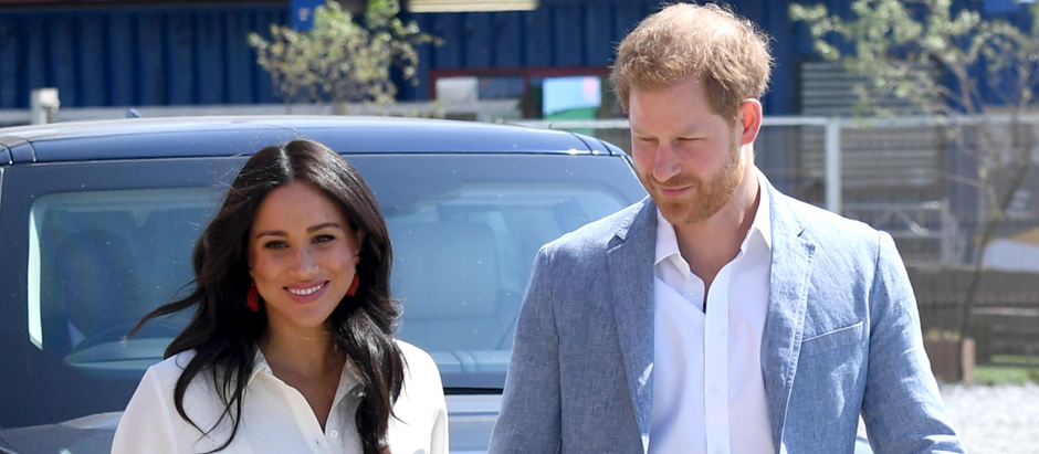 Britain's Prince Harry and Meghan Markle, the Duke and Duchess of Sussex, during a visit to Tembisa township, near Johannesburg, South Africa, October 2, 2019  *** Local Caption *** .