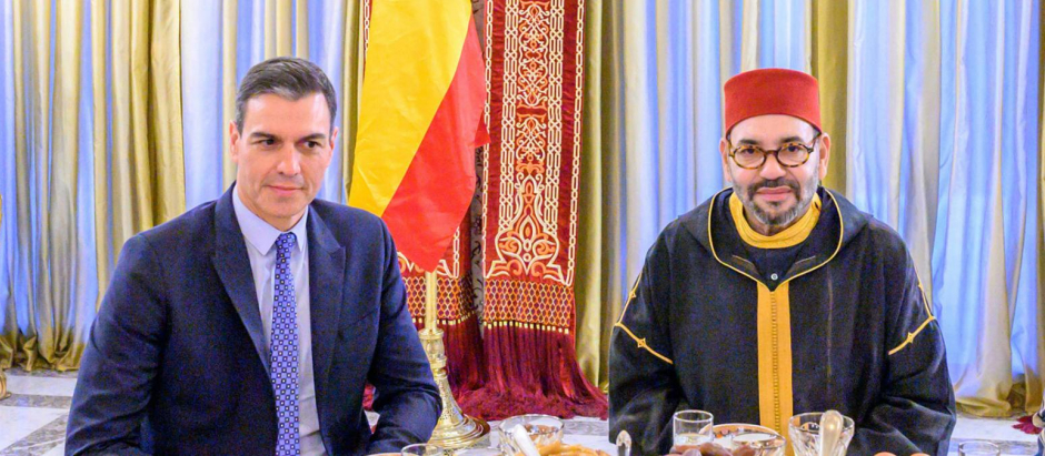 In this photo provided by the Royal Palace, Moroccan King Mohammed VI, center, Spain's Prime Minister Pedro Sanchez, second left, Crown Prince Moulay Hassan, second right, Prince Moulay Rachid, the king's brother, right, and Morocco's Prime Minister Aziz Akhannouch, left, pose before an Iftar meal, the evening meal when Muslims end their daily Ramadan fast at sunset, at the King Royal residence in Sale, Morocco, Thursday, April 7, 2022. Sanchez is on a two-day visit to Morocco that promises to mark an easing of diplomatic tensions centered on Morocco's disputed region of Western Sahara. (Moroccan Royal Palace via AP)