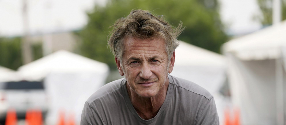 Actor Sean Penn, founder of Community Organized Relief Effort (CORE), is interviewed at a CORE coronavirus testing site at Crenshaw Christian Center, Friday, Aug. 21, 2020, in Los Angeles.