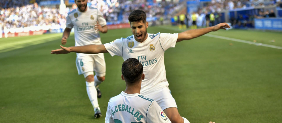 Dani Ceballos y Marco Asensio celebran un gol con el Real Madrid