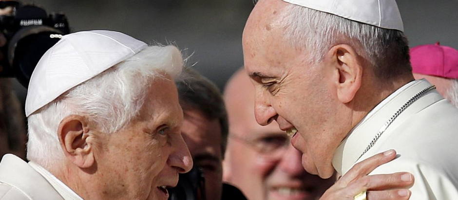 Pope Francis, right, greets Pope Emeritus Benedict XVI at the end of a meeting with elderly faithful  at the Vatican, Sunday, Sept. 28, 2014.