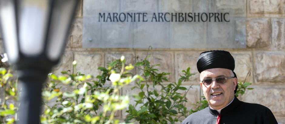 Maronite Archbishop of Haifa and the Holy Land Moussa el-Hage poses for a photograph outside his house in the northern Israeli coastal city of Haifa before a press conference on May 14, 2014 on the contraversial upcoming visit of the Patriarch of the Lebanon-based Maronite church and Cardinal of the Eastern Catholic Church, Beshara Rai, to Jerusalem to the Pope next week. AFP PHOTO / JACK GUEZ