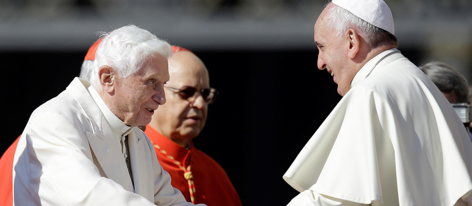 Pope Francis, right, greets Pope Emeritus Benedict XVI at the end of a meeting at the Vatican, Sunday, Sept. 28, 2014.