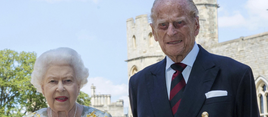 Britain's Queen Elizabeth II and Prince Philip the Duke of Edinburgh for a photo June 1, 2020, in Windsor, England, ahead of his 99th birthday on Wednesday.