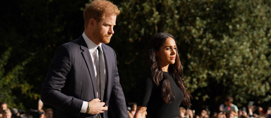 Britain's Prince Harry and Meghan Markle , Duchess of Sussex following the death of Queen Elizabeth II in Windsor, England, Saturday, Sept. 10, 2022.