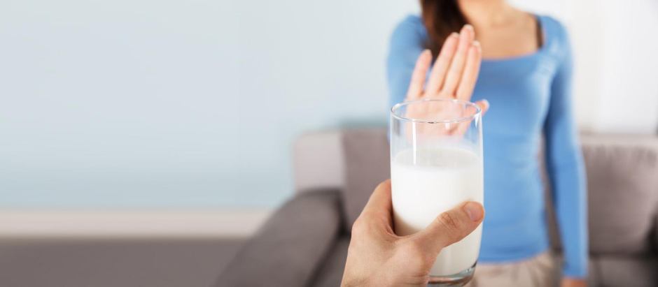 Close-up Of A Woman Rejecting Glass Of Milk At Home.Of,Woman,Rejecting,Glass,Milk,dairy, no, lactose, avoid, intolerance, milk, products, glass,dairy, no, lactose, avoid, intolerance, milk, products, glass,dairy, no, lactose, avoid, intolerance, milk, products, glass, rejection, reject, allergy, holding, person, stop, home, clean, woman, cold, food, sign, panoramic, banner, hand, breakfast, giving, background, health, women, product, interior, girl, intolerant, lady, serve, liquid, young, showing, transparent, female, focus, refusal, finger, adult, closeup, copy, space, pure, indoors, caucasian, prohibition