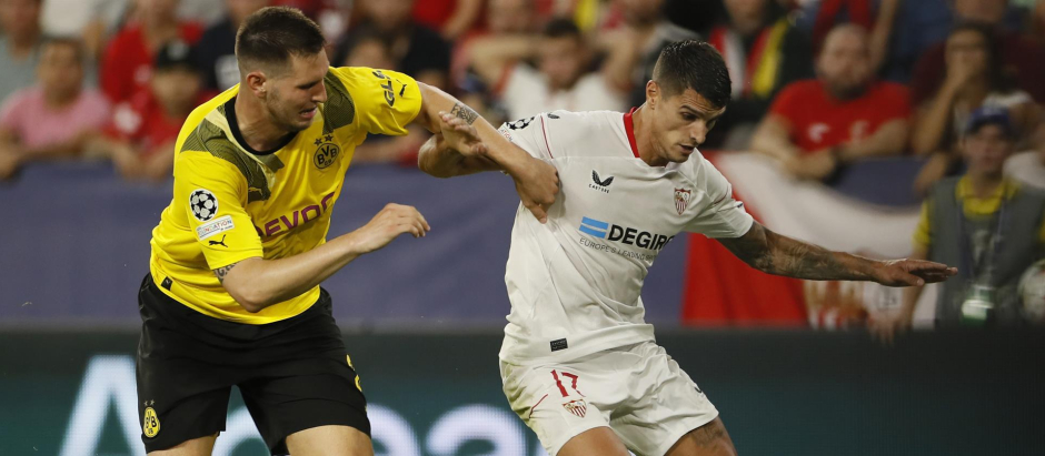Lamela y Niklas Süle en el partido entre Sevilla y Dortmund de hace una semana